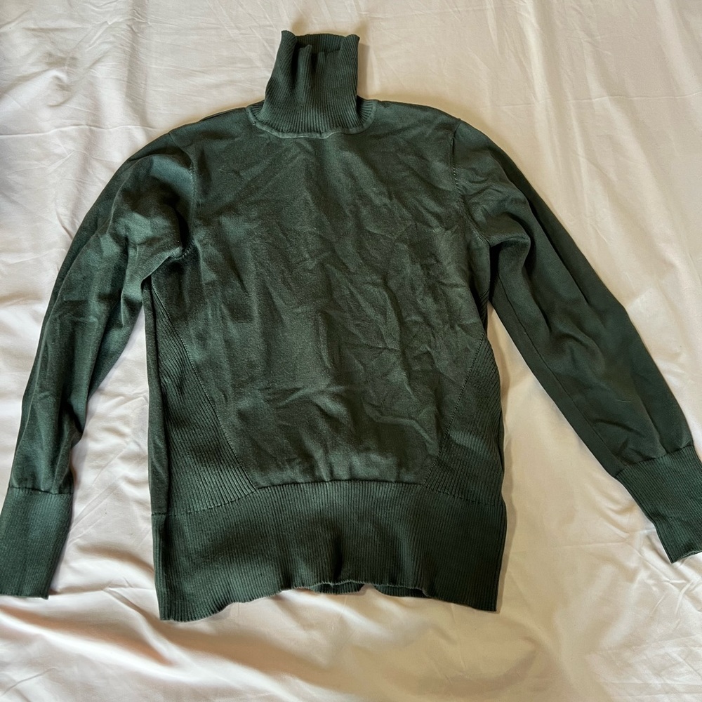 Dark green turtle neck sweater